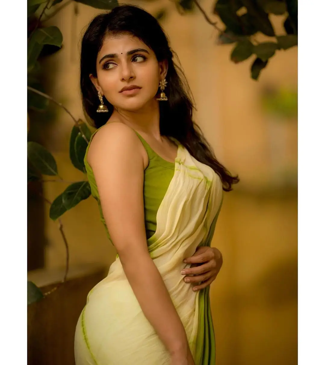 Indian Actress Iswarya Menon In Traditional Green Saree Sleeveless Blouse